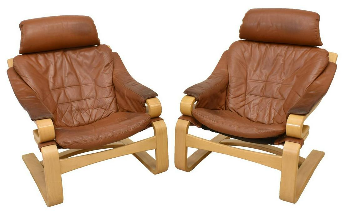 (2) SWEDISH MODERN KROKEN STYLE LOUNGE CHAIRS: (lot of 2) Swedish modern lounge chairs, c.1970s, in the manner of the "Kroken" chair designed by Ake Fribytter, bentwood frame with brown leather upholstered back and seat cushion, rip under seat cus