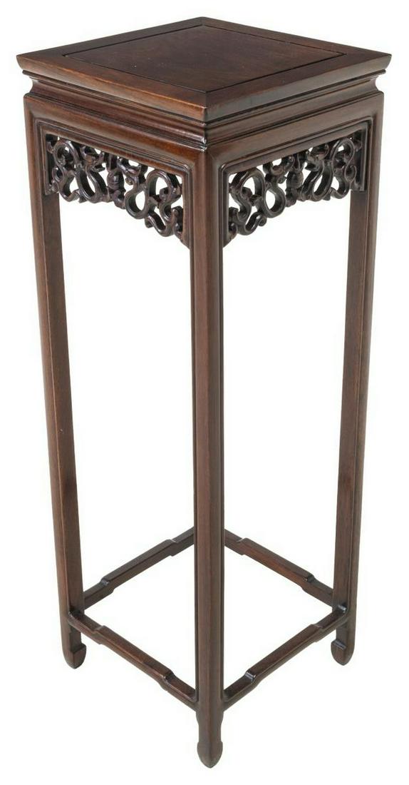 CHINESE MAHOGANY PLANT STAND PEDESTAL: Chinese mahogany stand/ pedestal, having squared top, openwork apron with dragons, rising on stretcher-joined squared legs, ending in hoof feet, approx 36"h, 12.5"w, 12.5"d **Provenance: from a privat