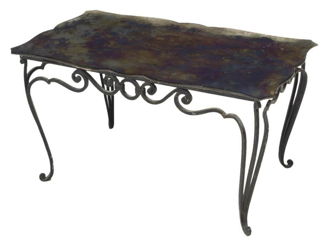 VINTAGE FRENCH GLASS-TOP IRON COFFEE TABLE: Vintage French iron coffee table, 20th c., having shaped glass top, fitted atop wrought iron base, approx 18"h, 33"w, 18.75"d Start Price: $50.00