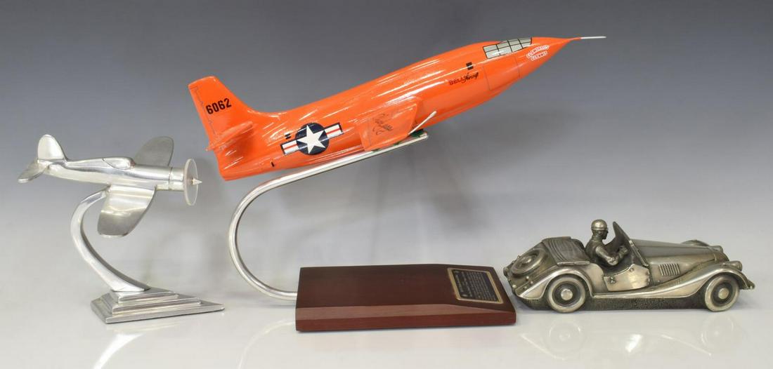(3) VINTAGE DECORATIVE MODEL CAR & FIGHTER PLANES: (lot of 3) Vintage decorative items, including: (1) autographed Bell X-1 Model Airplane, signed on wing by Chuck Yeager; (1) silverplate fighter jet on base, (1) model car, largest: approx 8.5"h, 13"w