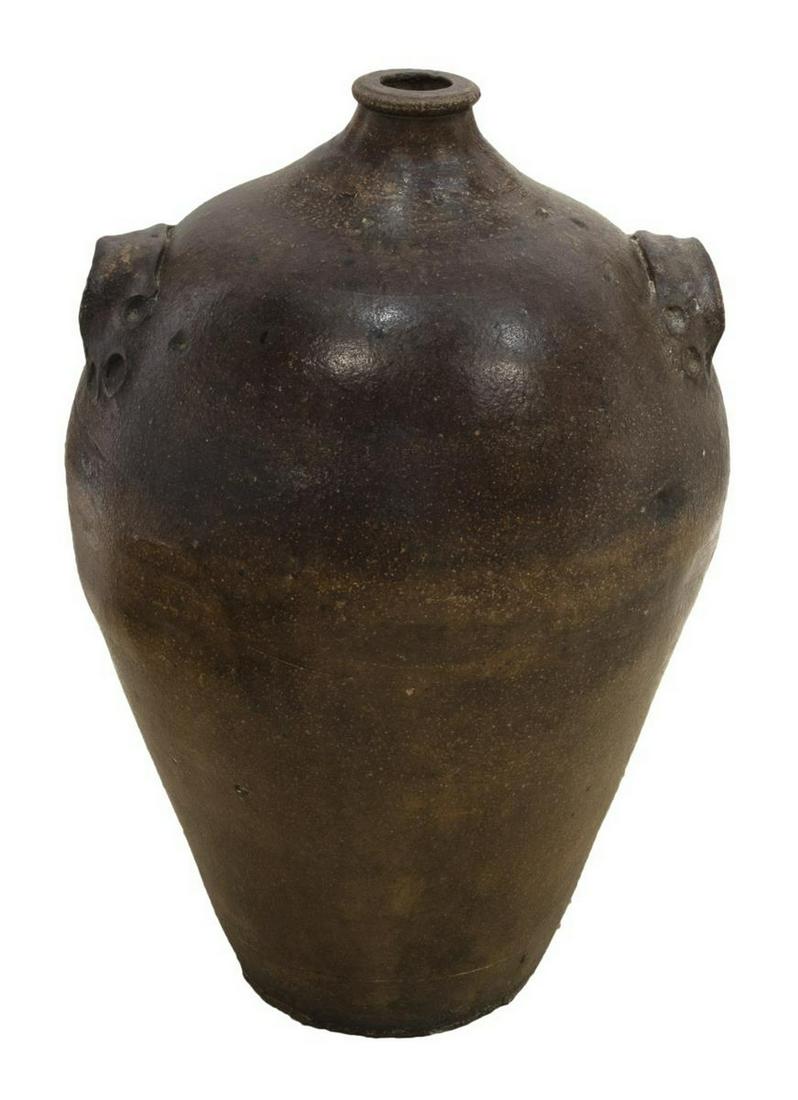 LARGE VINTAGE EARTHENWARE WINE JUG, 27"H: Large vintage earthenware wine jug, having dark brown glaze, applied handles at each side, on circular foot, approx 27"h, 10"w Start Price: $100.00