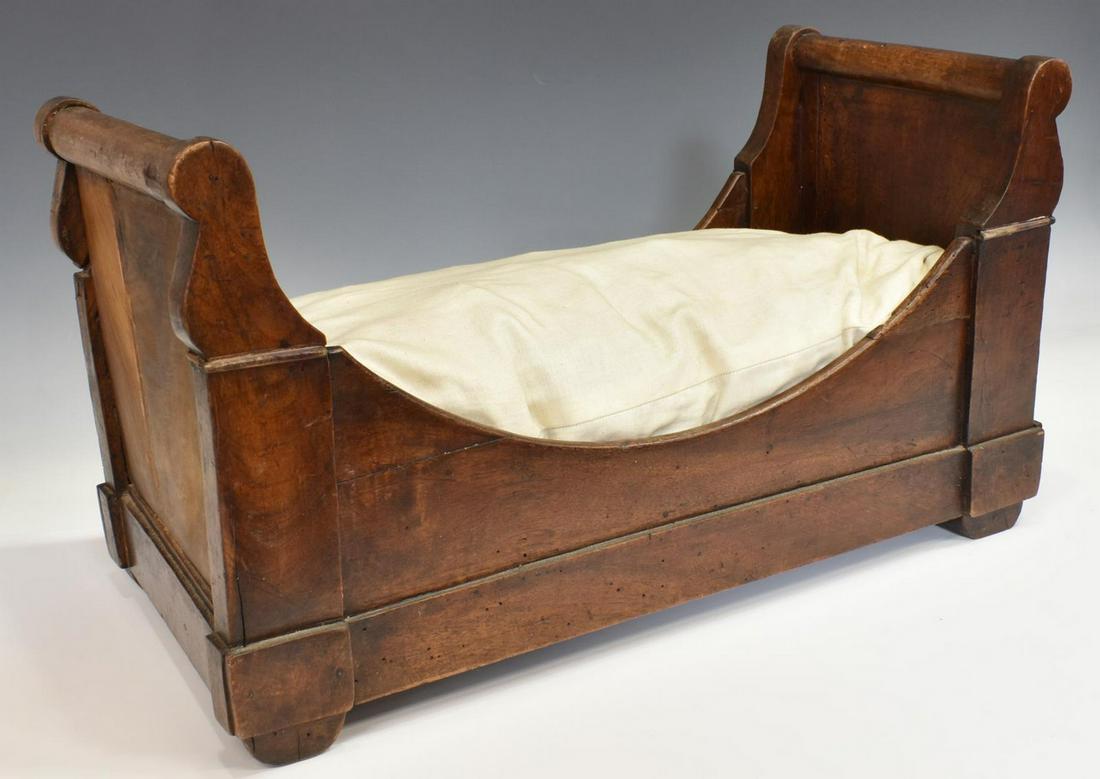 FRENCH EMPIRE STYLE SALESMAN SAMPLE/ DOLL BED: French Empire style salesman sample / doll's alcove bed, late 19th c., mahogany frame, restorations, approx 12"h, 21.5"w, 10.5"d, 6.5lbs Start Price: $100.00