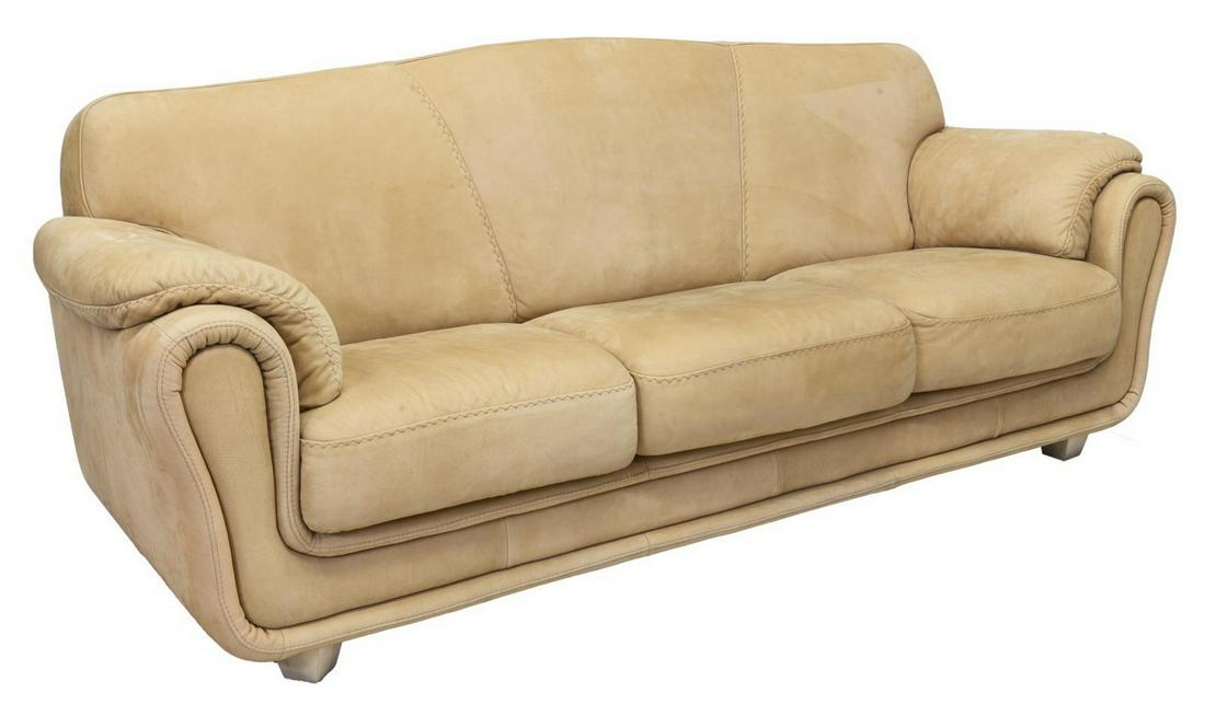 MODERN CONTEMPORARY LEATHER THREE-SEAT SOFA: Modern leather sofa, late 20th c., having three removable seat cushions, rolled arms, rising on tapered wood legs, slight spotting and patination, approx 35.5"h, 87.5"w, 35"d Start Price: $400.00
