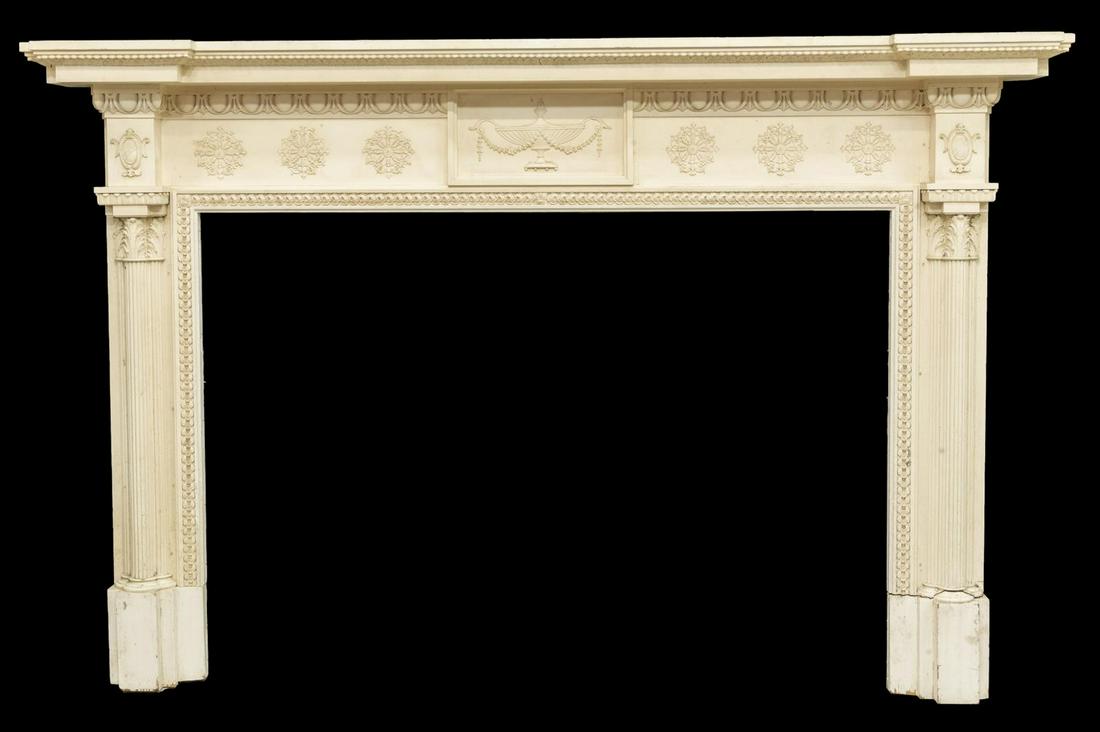 ARCHITECTURAL NEOCLASSICAL FIREPLACE MANTEL: Architectural Neoclassical fireplace mantel surround, off-white painted, with egg and dart molding, floral roundels centering neoclassical urn, fluted columns with acanthus capitals, plinth base, exte