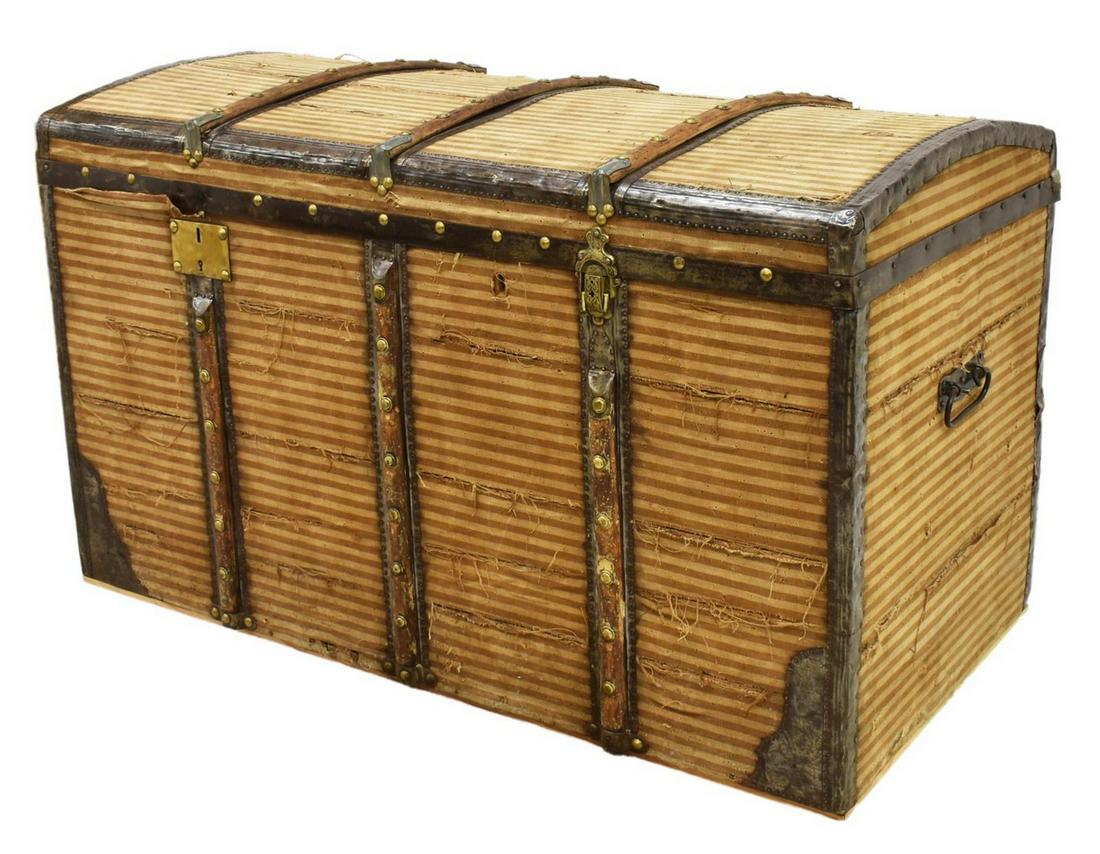 FRENCH DOME TOP TRAVELING TRUNK: French dome top traveling trunk, 19th c., the exterior covered in striped textile, on a wood and iron frame, the top with alternating riveted iron bands and wood bands accented by nail heads, lifting 