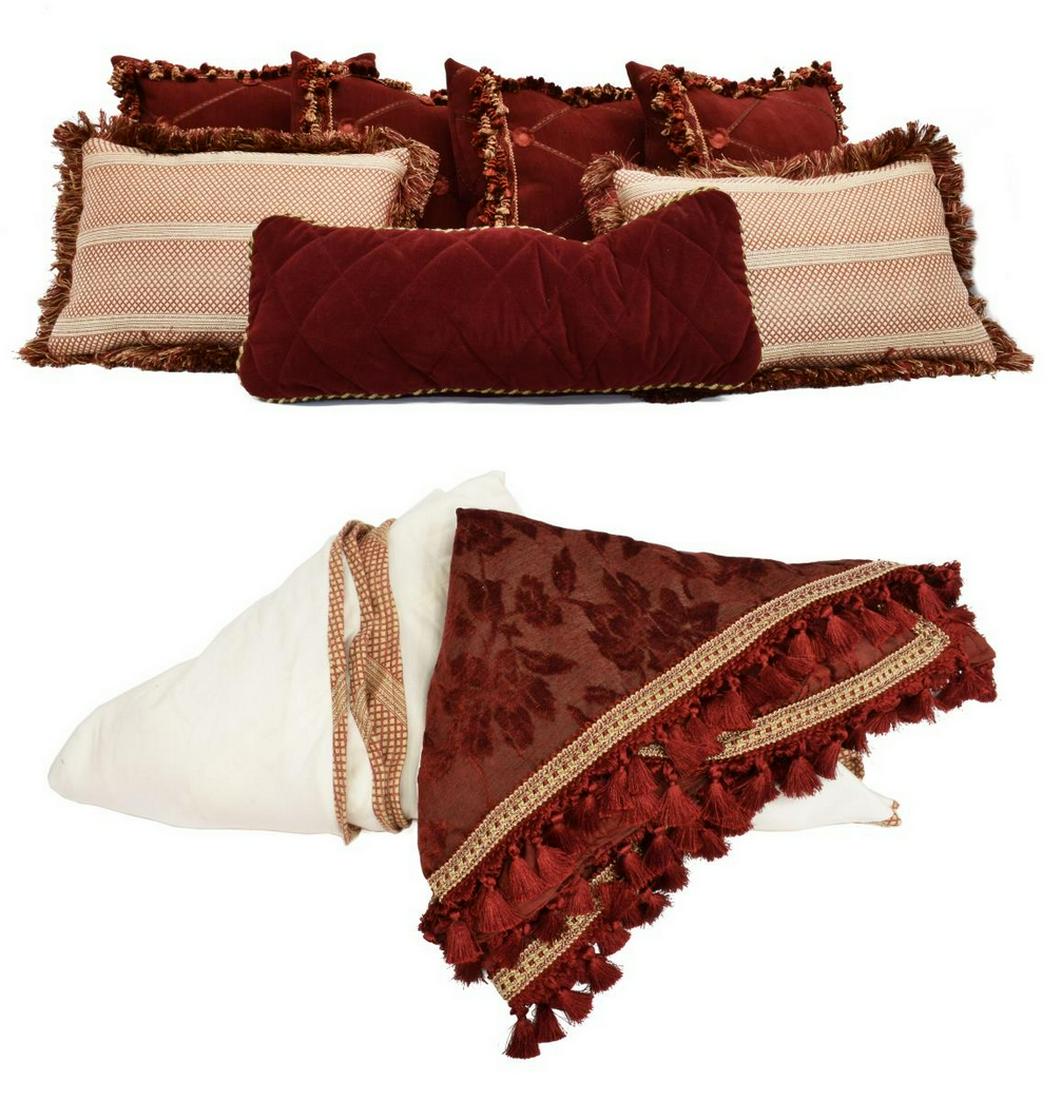 (11) DECORATIVE TEXTILES & THROW PILLOWS: (lot of 11) Decorative textiles, including: (2) throw pillows, down filled, with brush fringe trim, (1) long throw pillow, with braid trim, (4) throw pillows, down filled, tassel trim, (1) circular ta