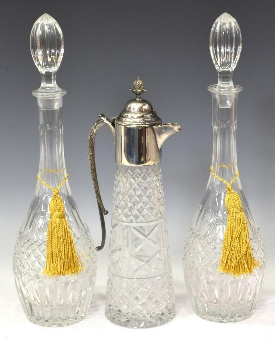 (3) CUT CRYSTAL DECANTERS & SILVERPLATE CLARET JUG: (lot of 3) Crystal barware, including: (2) cut crystal decanters with stoppers, one base with small abrasion, approx 15.75"h, 4.25"diam; (1) pitcher, having a silverplate collar, spout and handle, on 