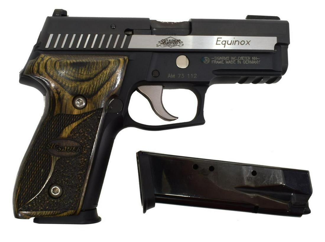 SIG SAUER P229 EQUINOX DA PISTOL, .40 S&W CALIBER: Sig Sauer P229 Equinox pistol, .40 S&W caliber, double action, 3.9" barrel, black matte stainless finish with chrome highlights, Sig grips, two magazines, SN AM 73 XXX Start Price: $300.00