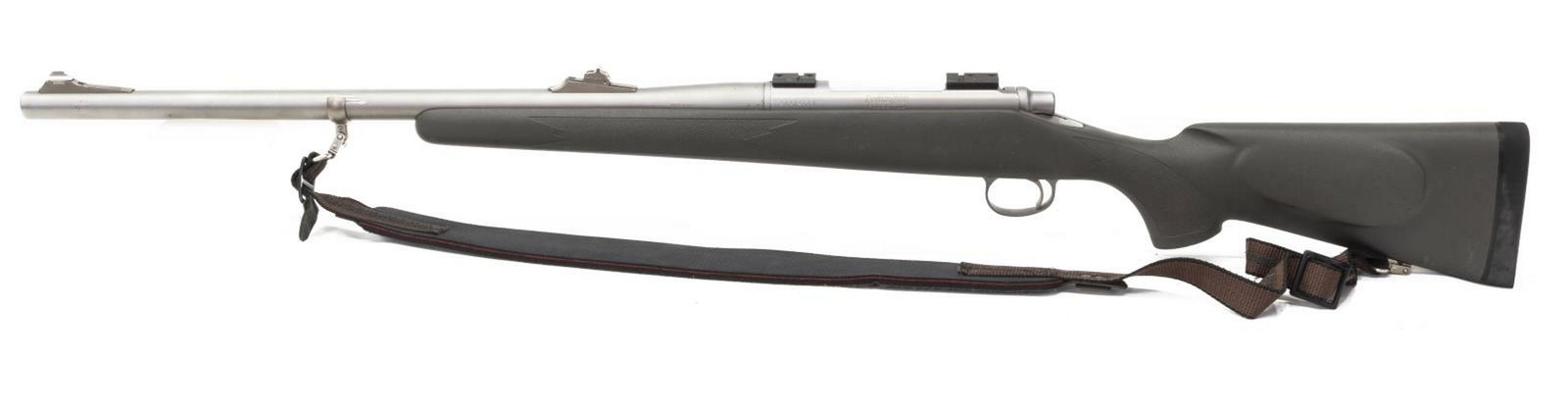 REMINGTON MODEL 700 RIFLE, .416 REM MAGNUM CALIBER: Remington Model 700 Safari rifle, .416 Rem Magnum caliber, bolt action, 22" stainless steel barrel, adjustable rear sight, scope ramps, Kevlar checkered stock with cheekpiece, Remington recoil pad, tw