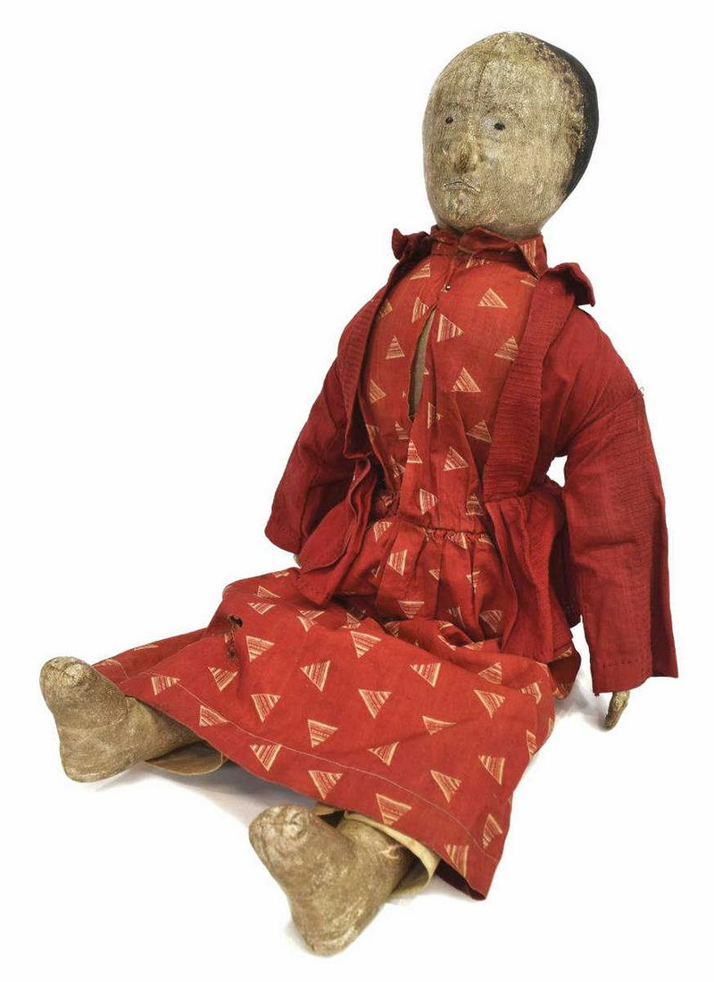 AMERICAN FOLK ART OIL PAINTED CLOTH BODY DOLL: Scarce American Folk Art oil painted cloth doll, forth quarter 19th c., cloth body, slightly modeled features, painted hair, stitched fingers, elbow, hip and knee joints, wearing a red over jacket and