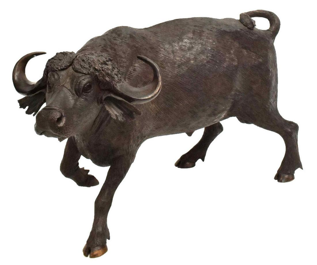GONDO AFRICAN CAPE BUFFALO IRONWOD SCULPTURE 16"W: Large African Cape Buffalo hand carved ironwood sculpture, signed M.Gondo (Mopho Gondo, South Africa), dated 1997, naturalistically carved buffalo depicted in walking stance, detail to horns, ears, sn