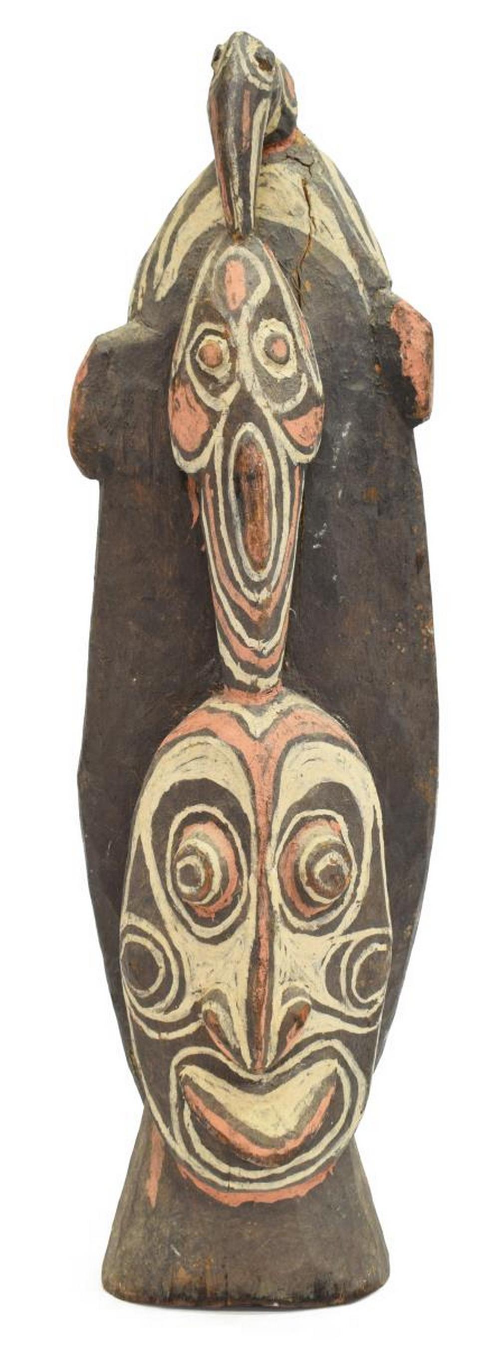 LARGE OCEANIC TRIBAL SEPIK DOUBLE FACE MASK: Large Oceanic painted tribal double face mask, Sepik, New Guinea, elongated face with exaggerated eyes and nose, painted in red, white and black pigments, with geometric designs, back of mask having b