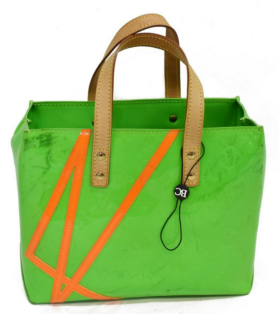 LOUIS VUITTON 'READE' ROBERT WILSON HANDBAG: Louis Vuitton 'Reade' PM handbag, from the Robert Wilson collection, monogram Vernis leather, with gold-tone hardware, dual flat top handles, canvas lining, one slip pocket to the interior wall, retai