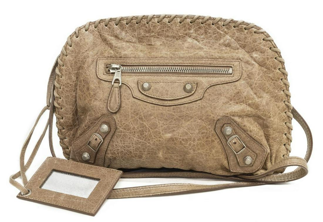 BALENCIAGA 'MOTOCROSS' DISTRESSED SHOULDER BAG: Balenciaga Motocross Two Way crossbody bag, in distressed leather, with silver-tone hardware, single flat shoulder strap (with tear), whipstitch trim, dual snap closures at top opening to black interi