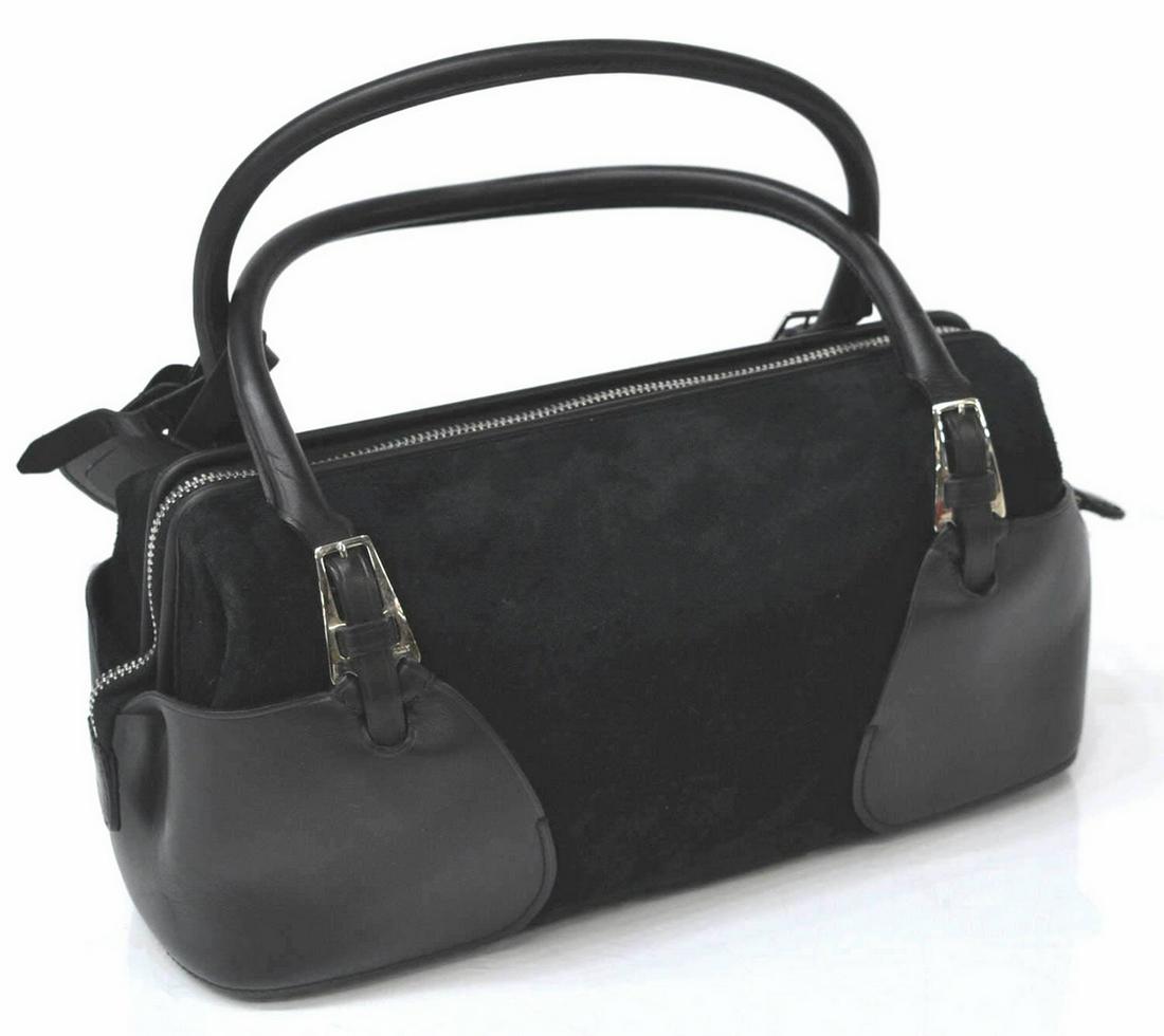 BALLY BLACK ON BLACK SUEDE LEATHER HANDBAG: Bally handbag in black suede and leather, silver tone hardware, smooth leather pockets to each end, dual rolled top handles above zipper top opening to lined interior with zippered pocket, accompanied