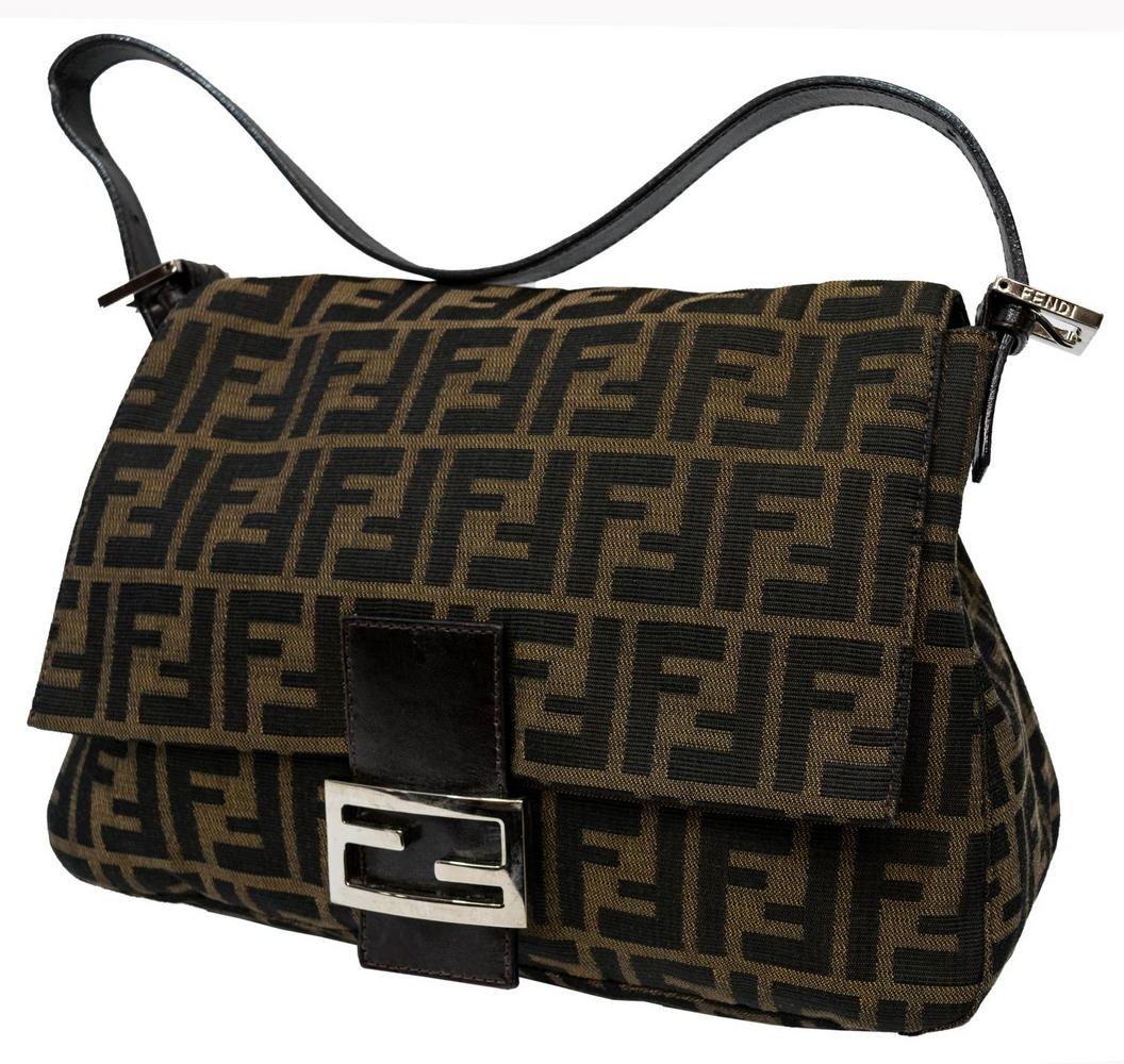 FENDI ZUCCA MONOGRAM CANVAS & LEATHER SHOULDER BAG: Fendi shoulder bag in brown Zucca monogrammed canvas, brown leather accents, silver tone hardware, magnetic snap opening flap to dark brown lined interior with single zip side pocket, adjustable shoul