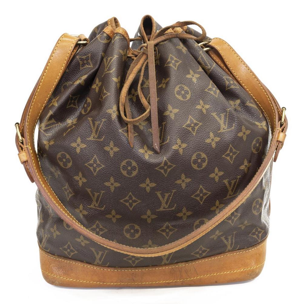 LOUIS VUITTON 'NOE' MONOGRAM BUCKET SHOULDER BAG: Louis Vuitton "Noe" bucket bag, in brown and tan monogram coated canvas, with brass hardware, tan vachetta leather trim, adjustable flat shoulder strap, drawstring closure at front face opening to bro