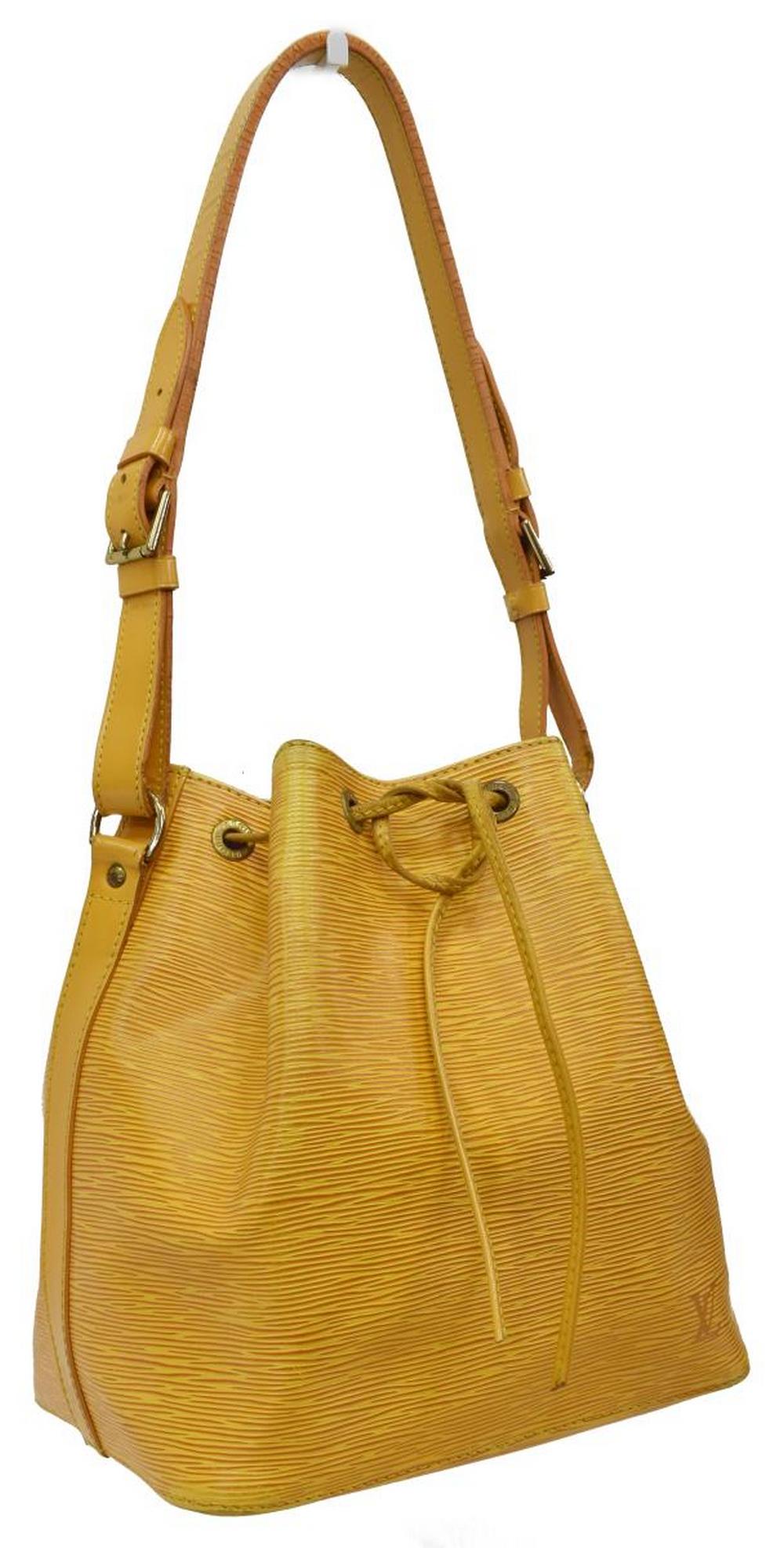 LOUIS VUITTON 'NOE PM' EPI LEATHER BUCKET BAG: Louis Vuitton â€œNoe PM” bucket bag, in yellow Epi leather, with brass hardware, adjustable flat shoulder strap, drawstring closure at front face opening to purple Alcantara lining, spotting