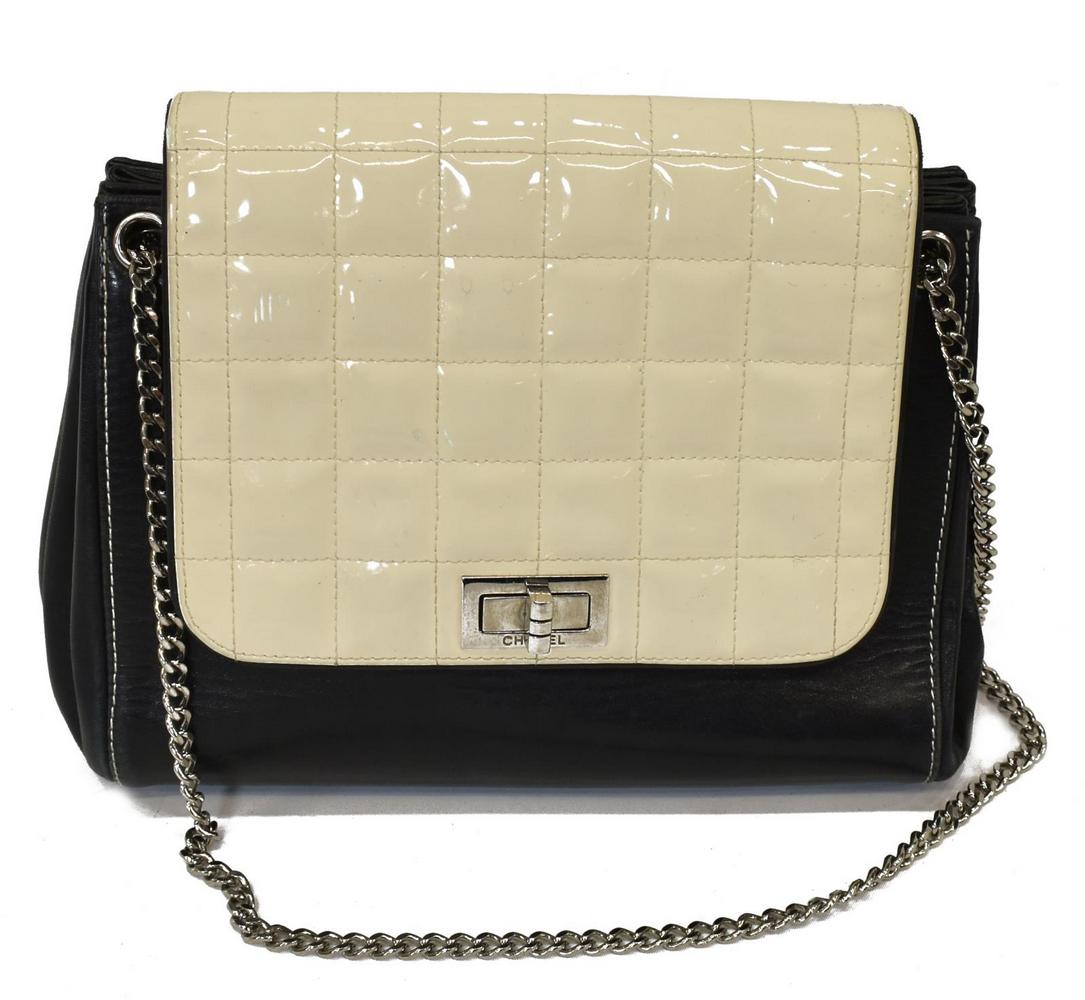 CHANEL BLACK & WHITE PATENT LEATHER SHOULDER BAG: Chanel shoulder bag, in smooth black leather with white patent leather Chocobar single flap, silver tone hardware, dual chain link shoulder strap, Mademoiselle turnlock to front opening to interior wi