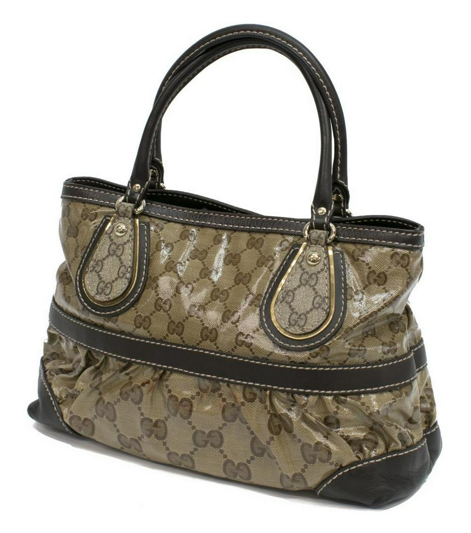 GUCCI CRYSTAL TOTE BAG IN GG COATED CANVAS: Gucci Crystal tote bag, in brown and tan GG coated canvas, with silver-tone hardware, brown leather trim with contrast stitching, dual rolled top handles, brown woven lining, three pockets at interior