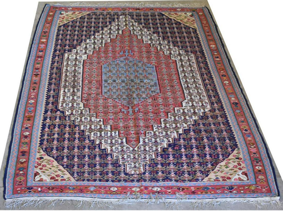 LARGE HAND-TIED TURKISH KILIM RUG, 9'1" X 6'8": Large hand-tied Turkish Kilim rug, rip to border, approx 9'1"l, 6'8"w Start Price: $100.00