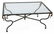 BRASS SWAN ACCENTED GLASS-TOP COFFEE TABLE