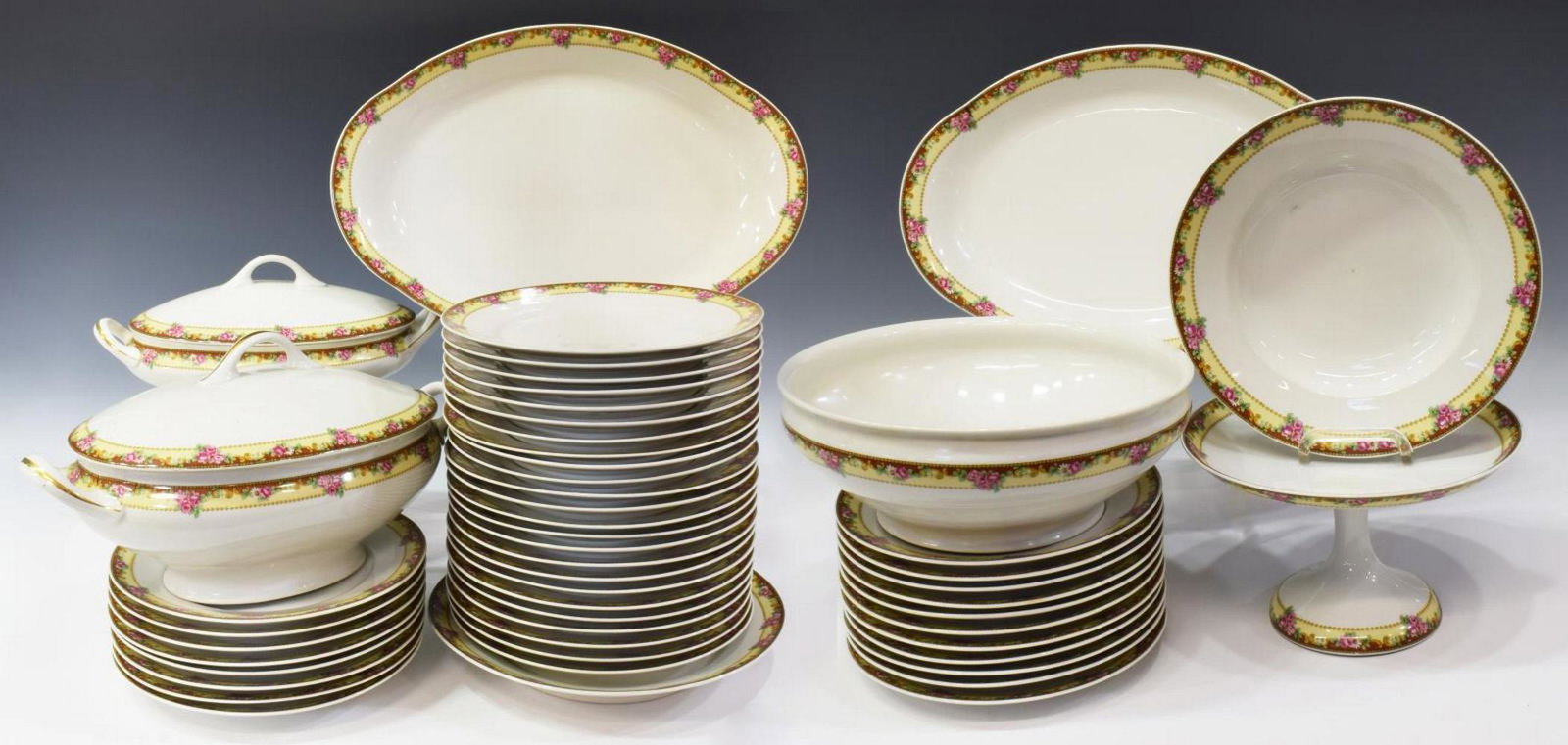 (51) FRENCH LIMOGES PORCELAIN DINNER SERVICE: (lot of 51) French Limoges porcelain dinner service, having white ground with polychrome floral border, comprising: (32) dinner plates, approx 9.5"diam; (11) salad plates, 8.75"diam; (1) shallow bowl,