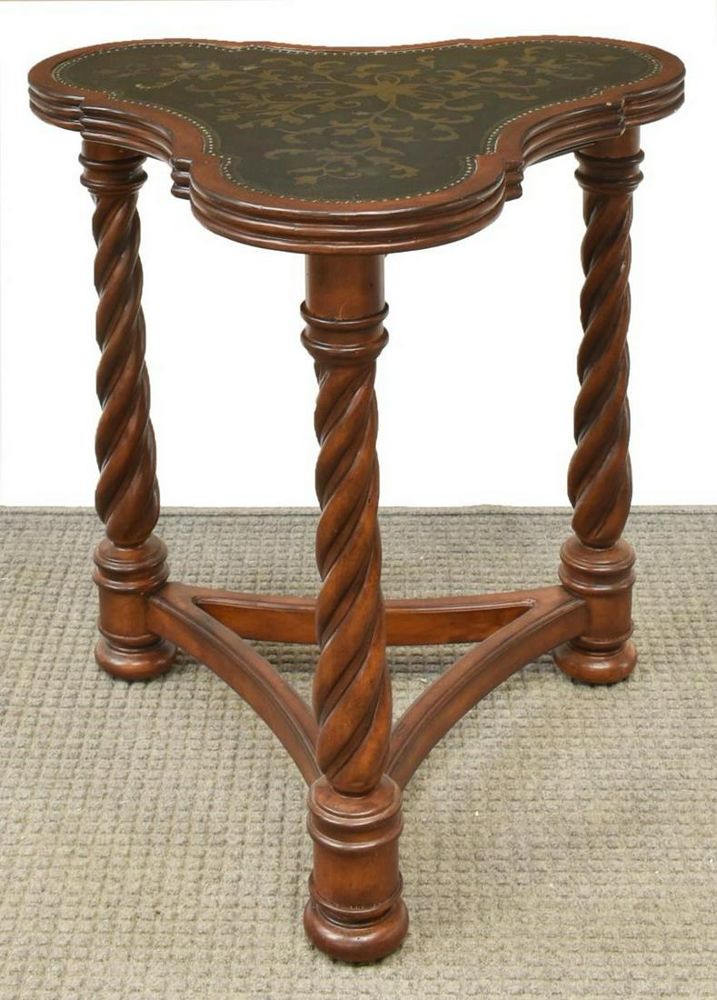 CONTEMPORARY 'LARANIE' SPIRALED LEG ACCENT TABLE: Contemporary "Laranie" accent table, late 20thc., having a lobed top with inset foliated metal surface, in a gilt and bronzed patina, rising on three spiraled stretcher joined legs, on bun feet, appro