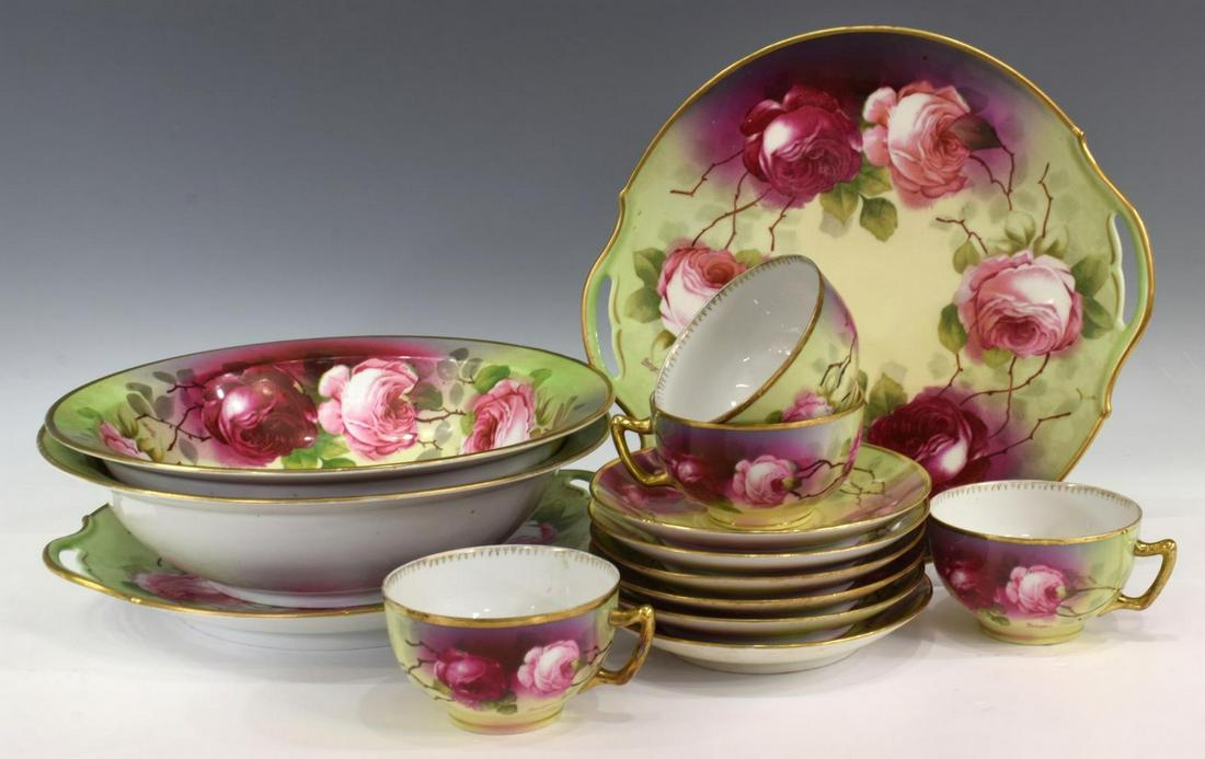 (14) O & EG ROYAL AUSTRIA HAND-PAINTED PORCELAIN: (lot of 14) Oscar and Edgar Gutherz Royal Austria porcelain dinnerware, having hand-painted rose decoration and gilt rims, comprising: (4) teacups, (one) with chip to rim, approx 2.25"h, 4.5"diam; (6)