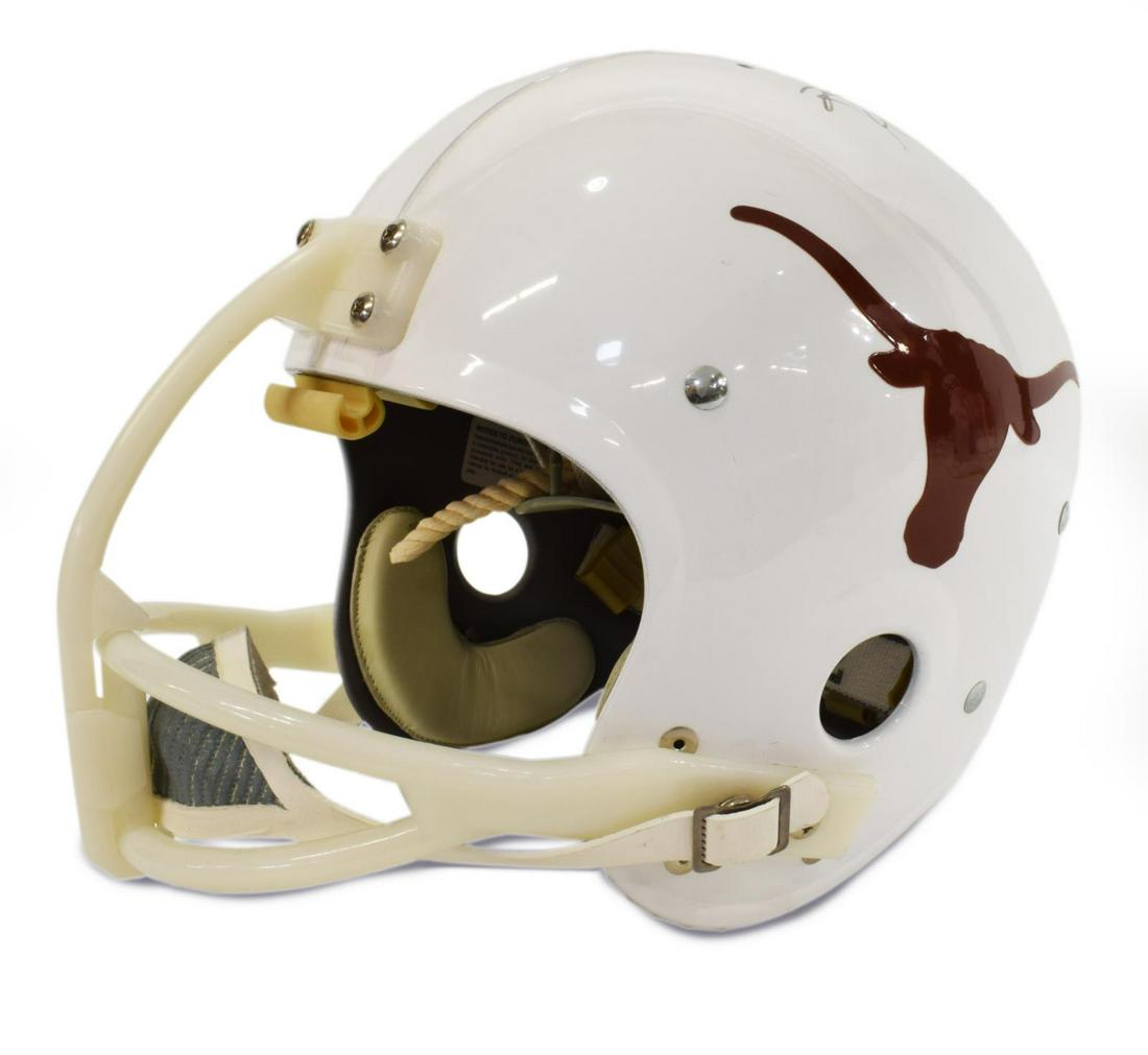 EARL CAMPBELL AUTOGRAPHED TEXAS LONGHORN HELMET: Earl Campbell autographed Texas Longhorn "Hilstoric Helmet", replica, Campbell was the first U.T. winner, in 1977, of the Heisman Trophy, 2.1lbs *Provenance: The Korman Collection, Monica and Hank Kor