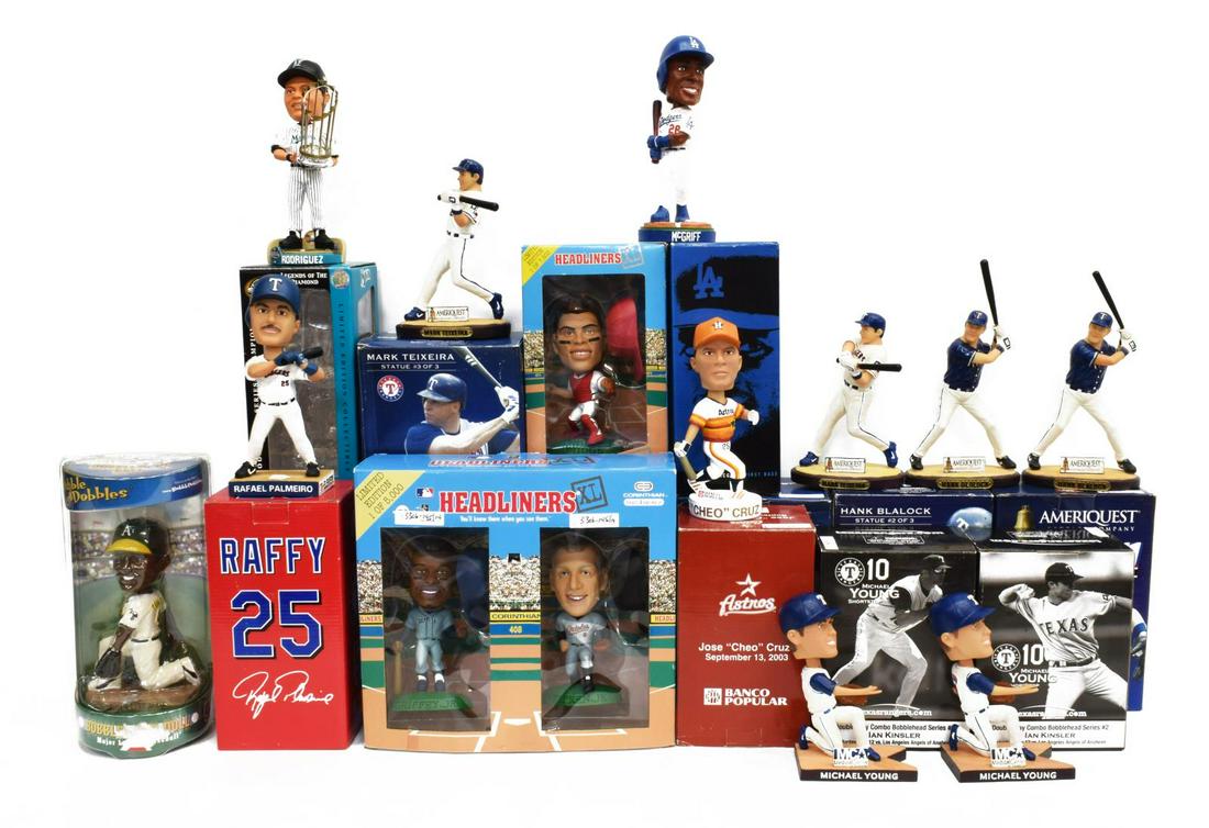 (14) BASEBALL BOBBLEHEADS, RIPKEN, GRIFFEY, TEJADA: (lot of 14) Baseball Bobbleheads: (1) Jose Cruz, Houston Astros; (1) Ivan Rodriguez, Marlins; (2) Michael Young, Texas Rangers; (2) Mark Teixeria, Texas Rangers; (2) Hank Blalock, Texas Rangers; (1) R