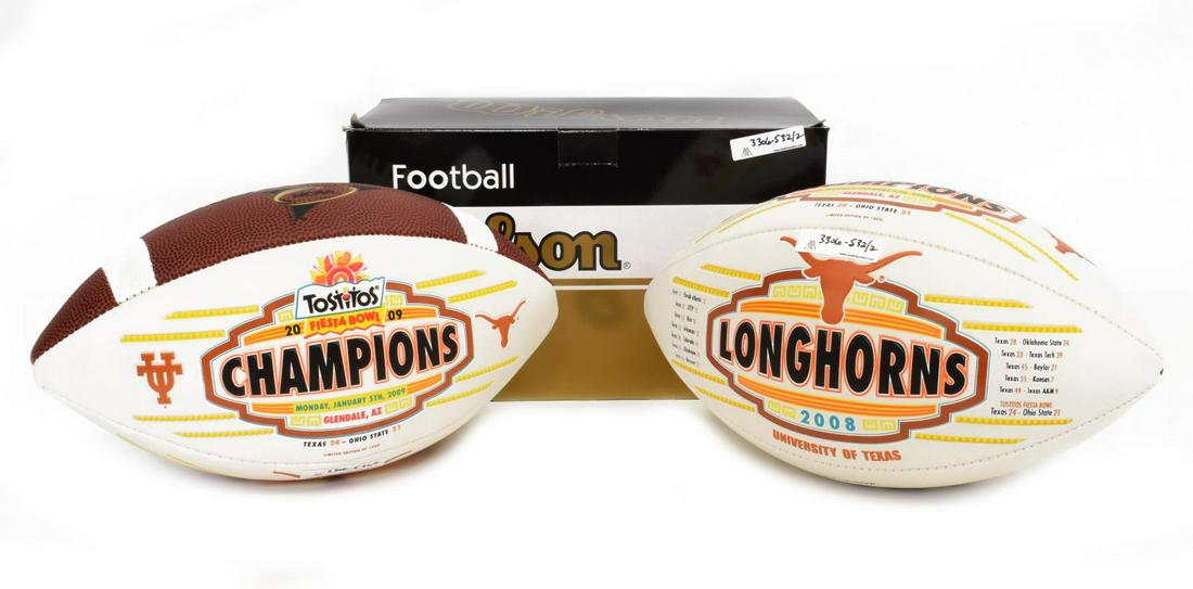 (2) TEXAS LONGHORNS TOSTITOS 2008 CHAM FOOTBALLS: (lot of 2) New in box 2009 Tostitos Champions Texas Longhorns football with original Wilson box 7"h, 11.25"w, 7"d, total: 2.4lbs *Provenance: The Korman Collection, Monica and Hank Korman, former co-o