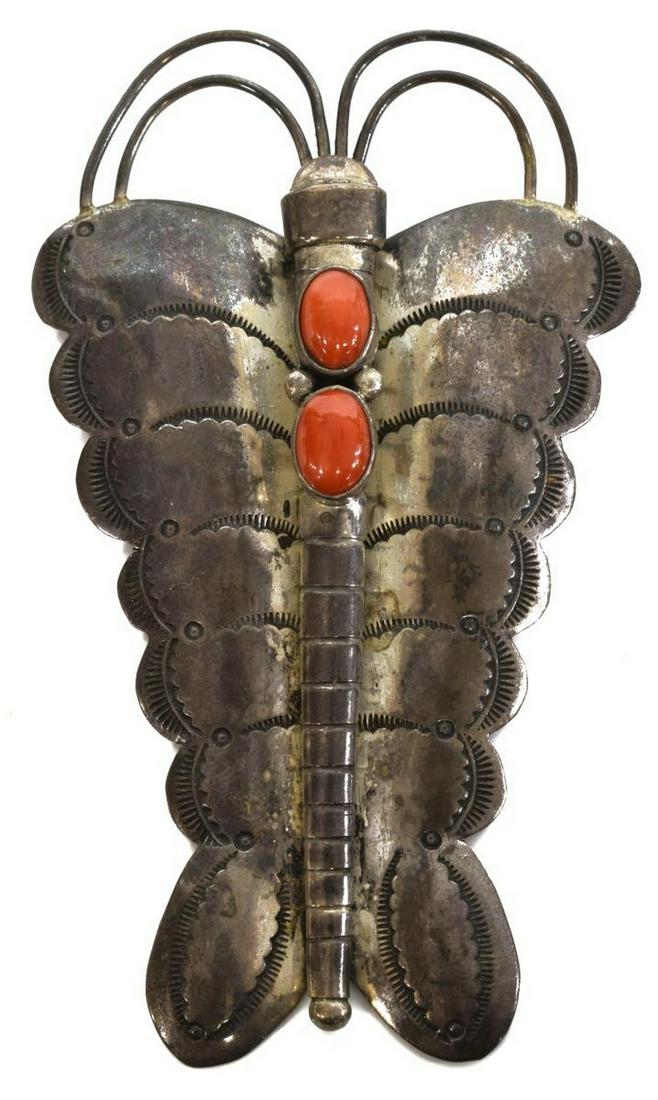 NATIVE AMERICAN NAVAJO SILVER CORAL BUTTERFLY PIN: Native American silver butterfly brooch, likely Navajo, with stamped designs, two central bezel-set red coral cabochons, approx 3.25"l, 1 7/8"w, 19.5 grams *Provenance: The family of Alfred A. King (T