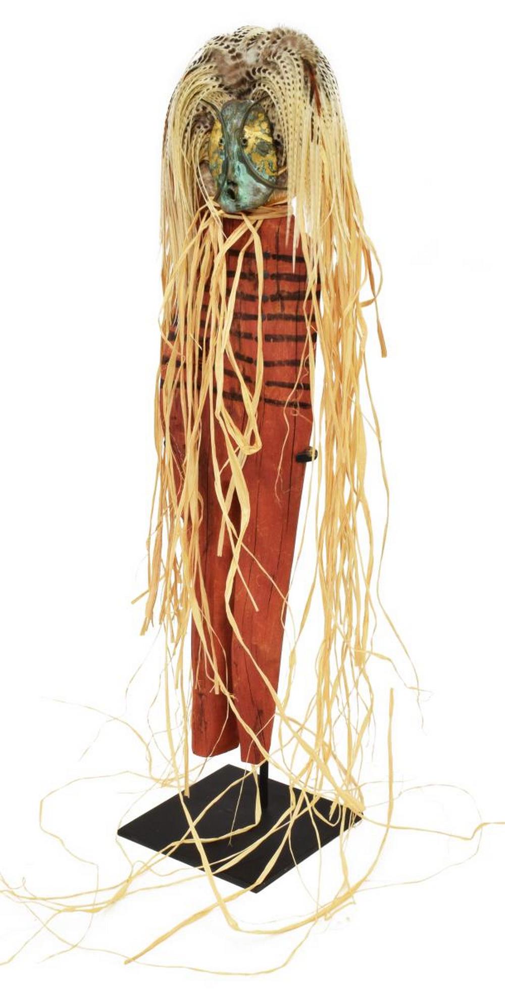 JIM COTTER (20TH C.) NATIVE AMERICAN SCULPTURE: Mixed media sculpture, Spirit Chaser, signed to back of the right leg Cotter (Jim Cotter, American, 20th c.), the standing carved wood figure with corn husk wrap, pheasant feather and raffia headdress