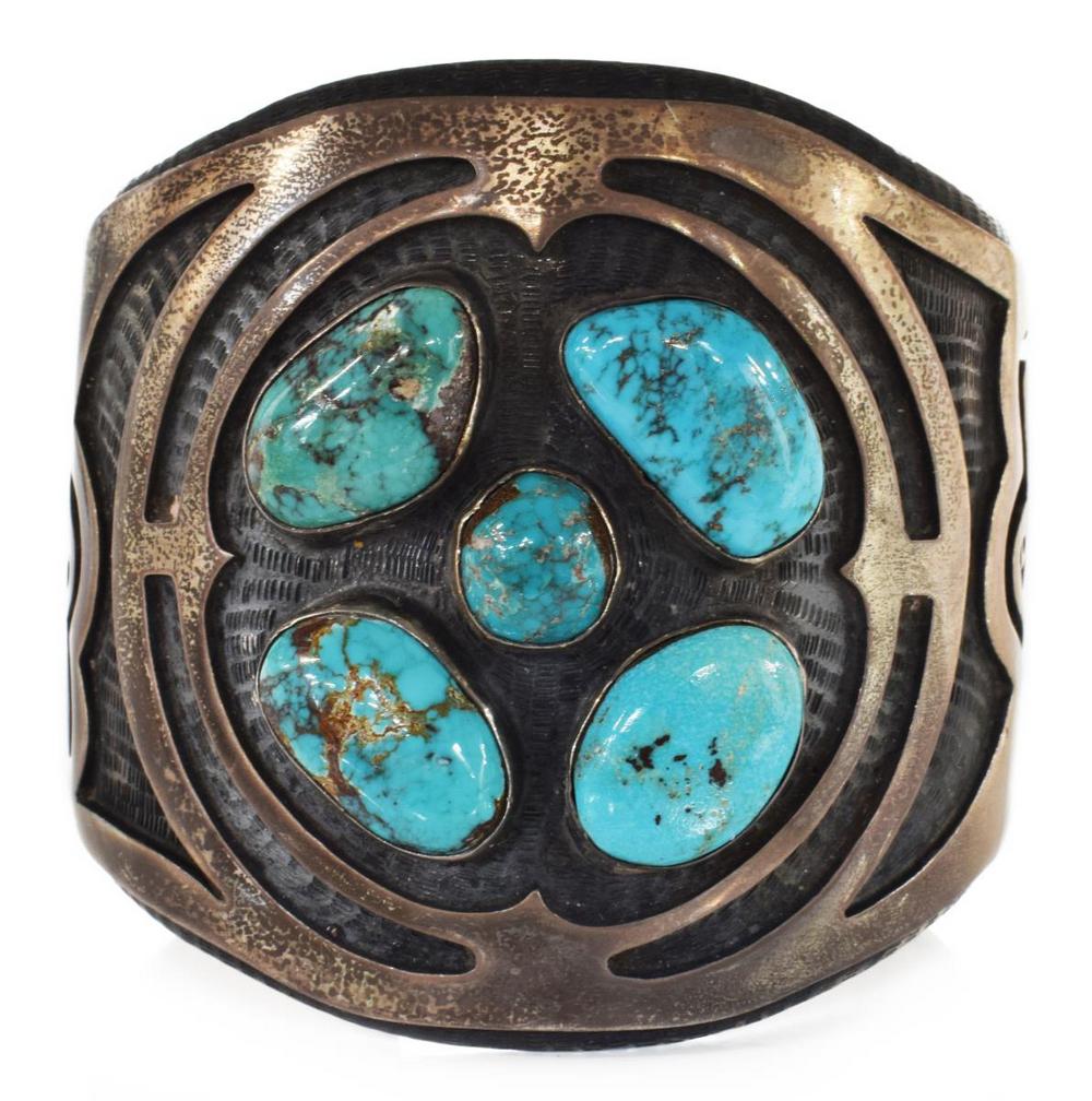 HOPI PHILIP SEKAQUAPTEWA TURQUOISE BUTTEFLY CUFF: Heavy Native American silver and turquoise cuff bracelet, Phillip Sekaquaptewa (Hopi, 1948-2003), the thick cuff approx 2 3/8"w with carved butterfly and stylized motifs, the top set with four turquoi