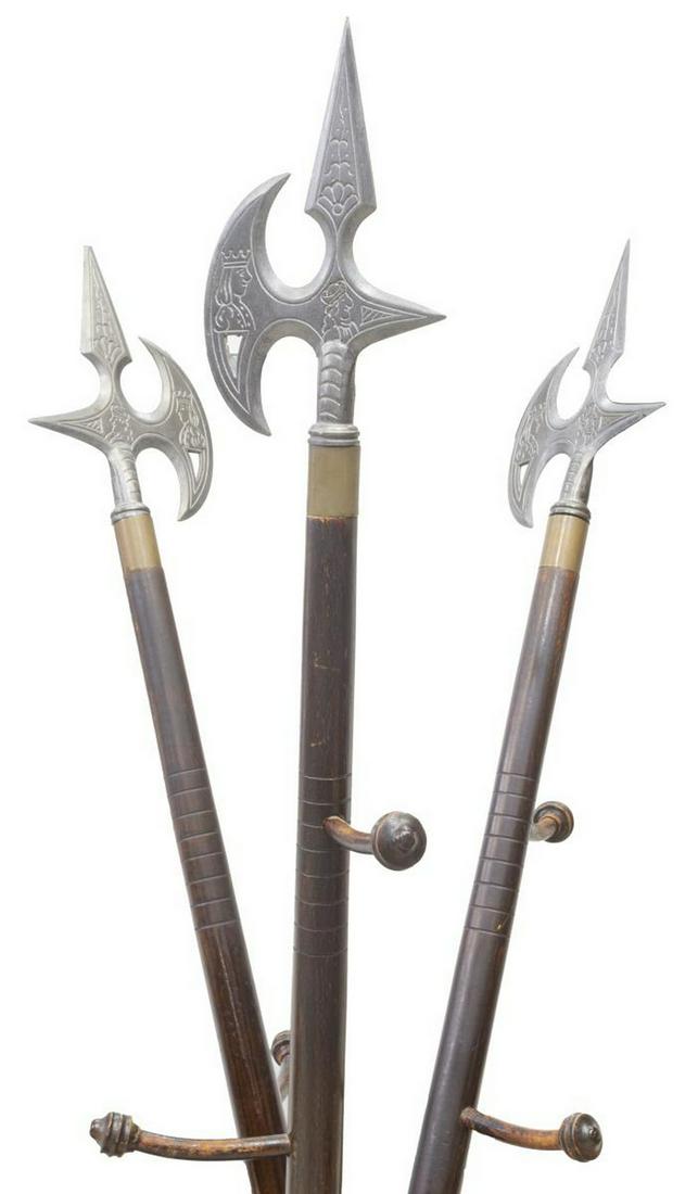 FRENCH THREE BATTLE-AXE HALL TREE: French battle-axes later mounted as a hall tree, featuring three axes having top etched with figural scene, base issuing five hooks, (one) hook missing, joined by triangular stretcher with inset drip 