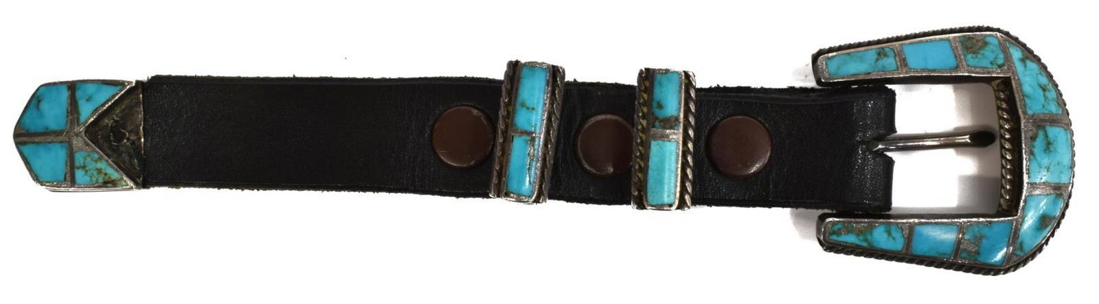 NATIVE AMERICAN SILVER & TURQUOISE BELT BUCKLE: Native American silver belt buckle, keepers, and tip, with channel-set turquoise, rope-twist edge, unmarked, buckle only: approx 1 7/8"l, 1 5/8"w; 55 grams total (inclusive of all materials) *Provenan