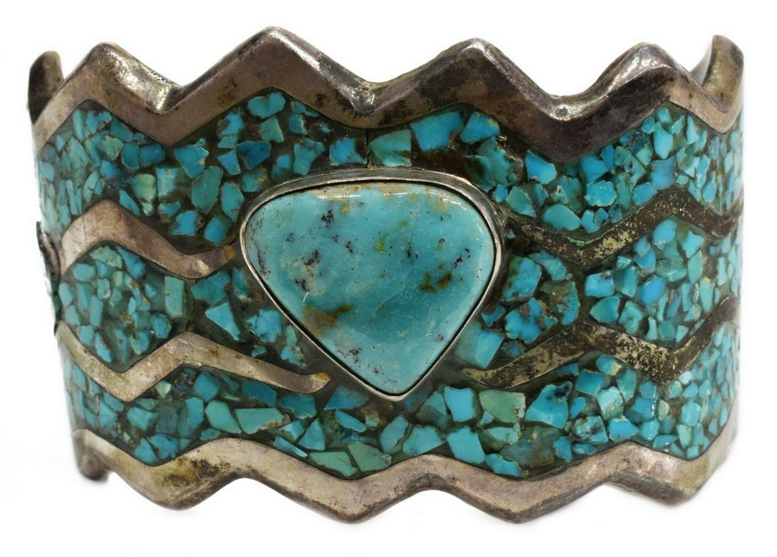 NATIVE AMERICAN SILVER & TURQUOISE CUFF BRACELET: Native American silver cuff bracelet, signed DZ RZ, inlaid with turquoise mosaic, central bezel-set turquoise cabochon, (one) section of turquoise inlay re-glued, interior: approx 2.25"w (across), 96.