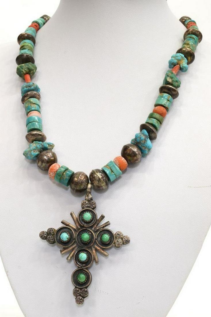 NATIVE AMERICAN BEADED NECKLACE DOUBLE-SIDED CROSS: Native American beaded necklace, with a variety of silver bench beads, red coral, turquoise nugget and disc beads, central double-sided cross pendant, one side with turquoise cabochons, the reverse wi