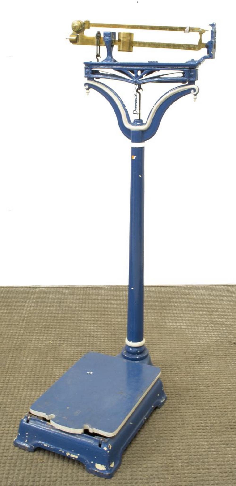 FRENCH CAST IRON & BRASS PAINTED SCALE: French cast iron scale, late 19th c., in blue and white paint, brass beam, center column, rectangular platform, approx 54.75"h, 23"w, 25"d Start Price: $100.00