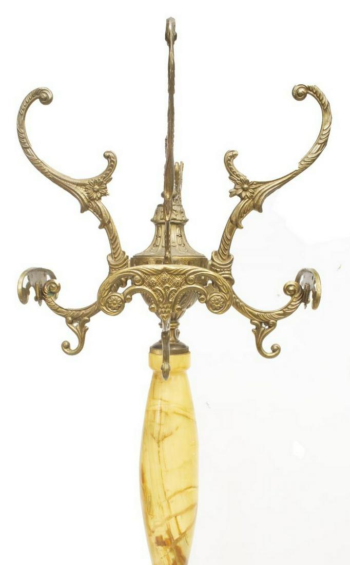 ITALIAN PATINATED METAL & ONYX HALL TREE COAT RACK: Italian patinated metal standing hall tree/ coat rack, 20th c., four hooks over onyx standard, patinated metal base with female demi figures, scrolled feet, approx 71"h, 20"diam Start Price: $100.00
