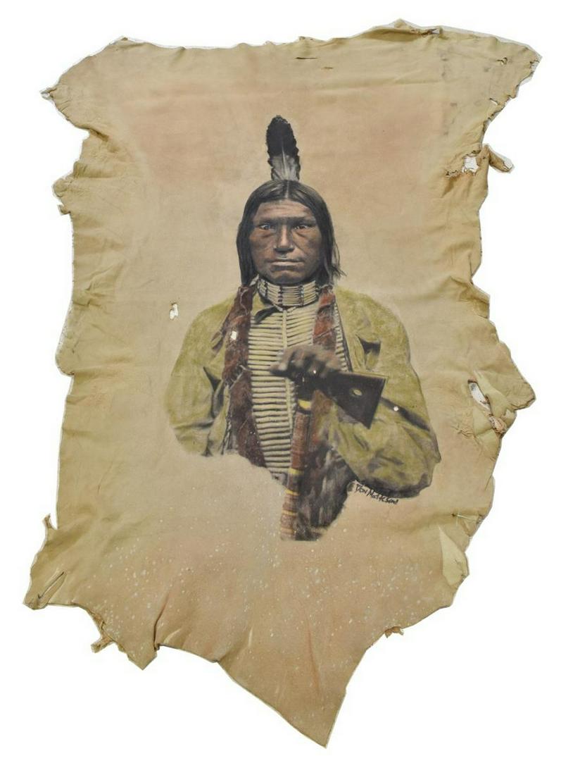 CONTEMPORARY NATIVE AMERICAN HIDE W/ PORTRAIT: Contemporary hide, with photographic impression of a Crow man, having painted highlights, signed lower right Don Matteson, after a photo by Edward Curtis (United States, 1868-1952), approx 53"l, 38"w 