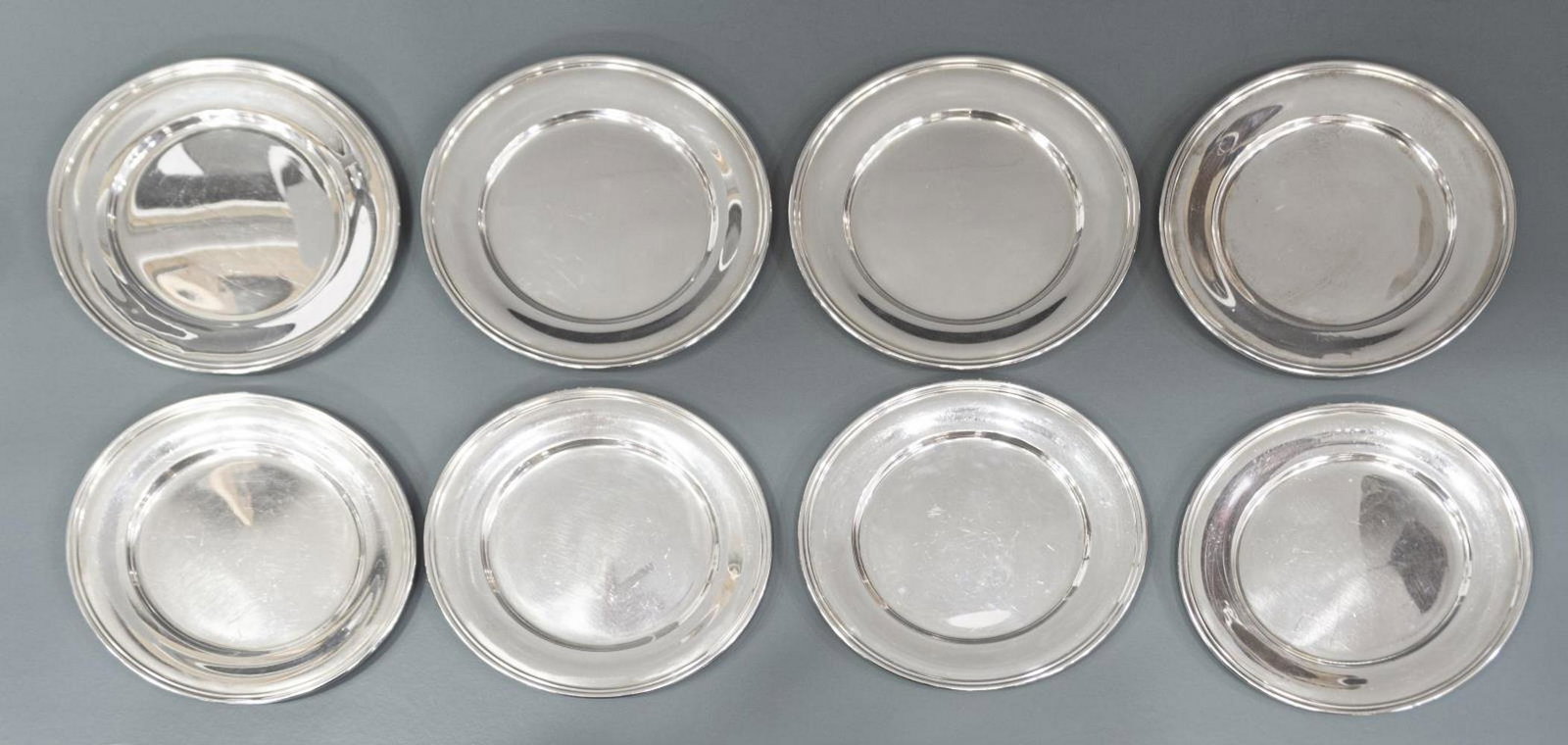 (8) S. KIRK & SON STERLING SILVER BREAD PLATES: (set of 8) American sterling silver side plates, Samuel Kirk & Son, #58, each of simple circular form, overall with some surface wear, approx 6"diam, 25.23ozt *Provenance: The family of Alfred A. King