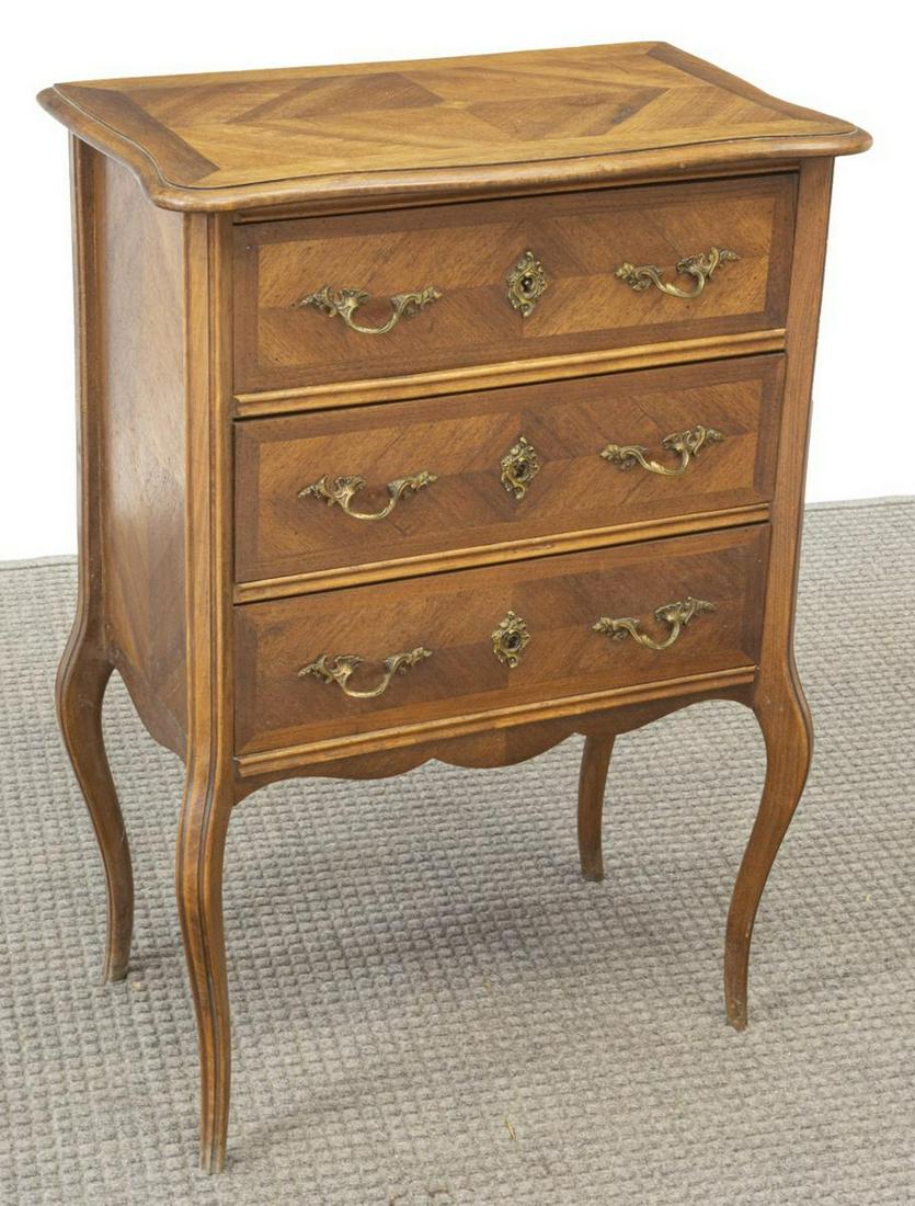 PETITE FRENCH LOUIS XV STYLE WALNUT COMMODE: French Louis XV style walnut commode, 20th c., serpentine front, fitted with three drawers, scalloped apron, rising on cabriole legs, approx 32.75"h, 23"w, 13.5"d Start Price: $200.00