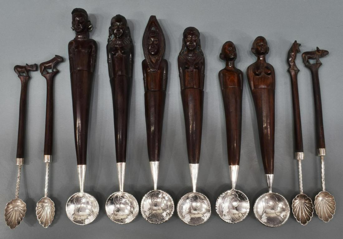 10) KENYA EBONY & MARIA THERESA THALER COIN SPOONS: (lot of 10) African figural carved ebony and silver spoons: (6) substantial well carved ebony tribal figure spoons, each with silver fitting ending in a Maria Theresa thaler coin, marked Kenya silver