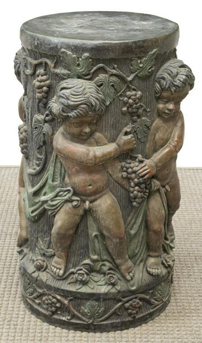 MARIO NARDINI BRONZE PEDESTAL CHERUBS IN RELIEF: Patinated bronze pedestal, late 20th c., with cherubs harvesting grapes in relief, signed in cast Mario Nardini (United States, 20th/ 21st c.), dated 3-10-80, approx 30.25"h, 20.5"diam Start Price: $1