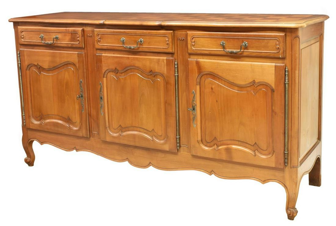 FRENCH LOUIS XV STYLE FRUITWOOD SIDEBOARD: French Louis XV style fruitwood sideboard, 20th c., having a parquetry top, three drawers above a left single-door cabinet fitted with dual shelves, and a right double-door cabinet opening to single s