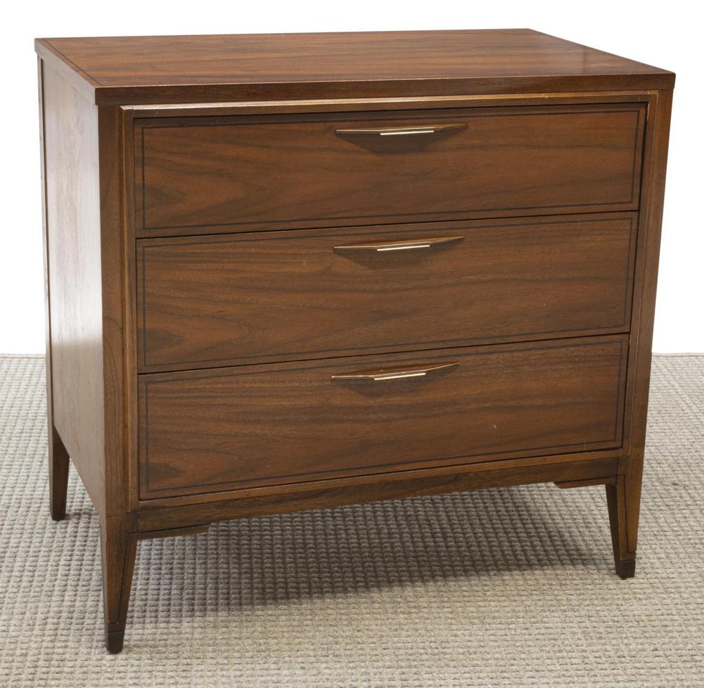 KENT COFFEY 'TEMPO' MID-CENTURY CHEST OF DRAWERS: American mid-century modern chest of drawers, from the "Tempo" collection by Kent Coffey, c.1960s, in a walnut finish, fitted with three drawers, rising on tapered legs, approx 30.5"h, 32"w, 19"d *Pro