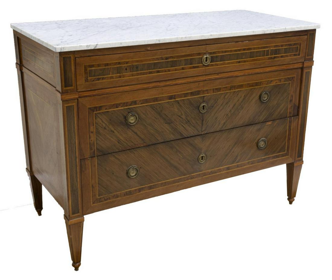 FRENCH LOUIS XVI STYLE MARBLE-TOP COMMODE: French Louis XVI style commode, 18th/ 19th c., having marble-top, the case in a matched veneer, with stringwork and parquetry accent, three drawers, rising on tapered legs, restorations, approx 36.25"