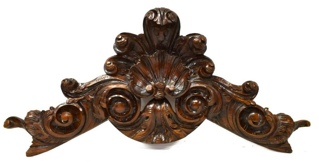 ITALIAN ARCHITECTURAL ELEMENT CARVED CREST: Italian architectural carved crest, 19th c., with shell and scrolling foliate elements, approx 14.5"h, 30.75"l Start Price: $80.00